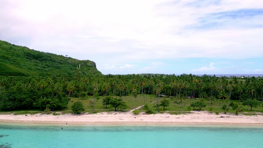 Scenic Aerial shot of Plage de Temae Public Beach in Moorea French Polynesia