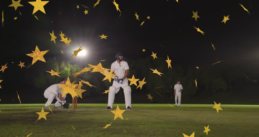 Batsman shifting on ball blocking to protect cricket stumps while gold stars drifting over players. Bat, bowler, keeper, field, night, floodlights, outdoor