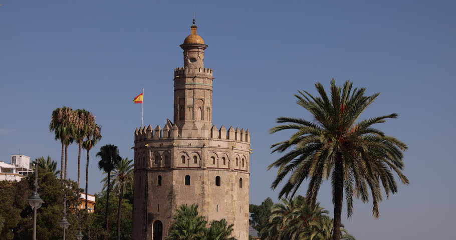 Afternoon view of the mid evil 13th century Moorish tower Torre del Oro in the old town of Seville, Andalusia, Spain.