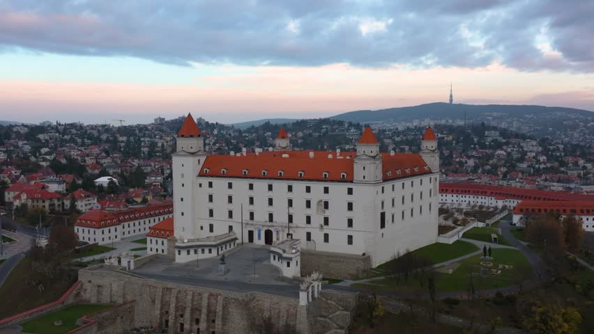 4K aerial sunrise view of Bratislava Castle in Slovakia_054