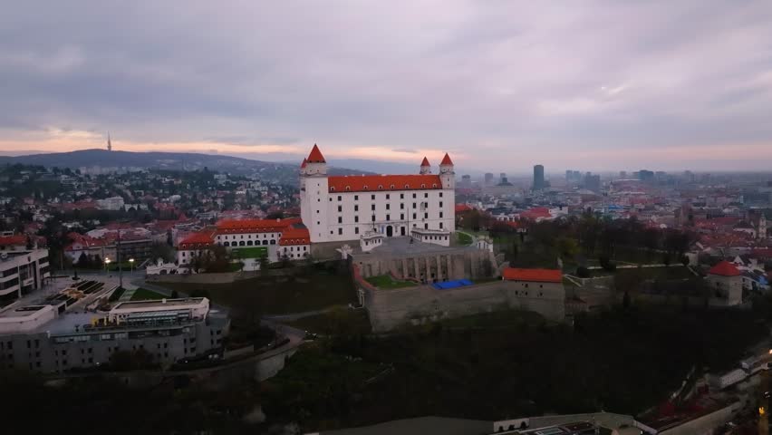 4K aerial sunrise view of Bratislava Castle in Slovakia_023
