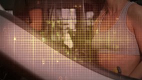 Couple standing by console, overlay pulsing revealing faces as grid tracking heart rate for fitness. Duo, workout, futuristic, hud, display, gym, wellness - Powered by Shutterstock - Get 15% off with code: PIKWIZARD15