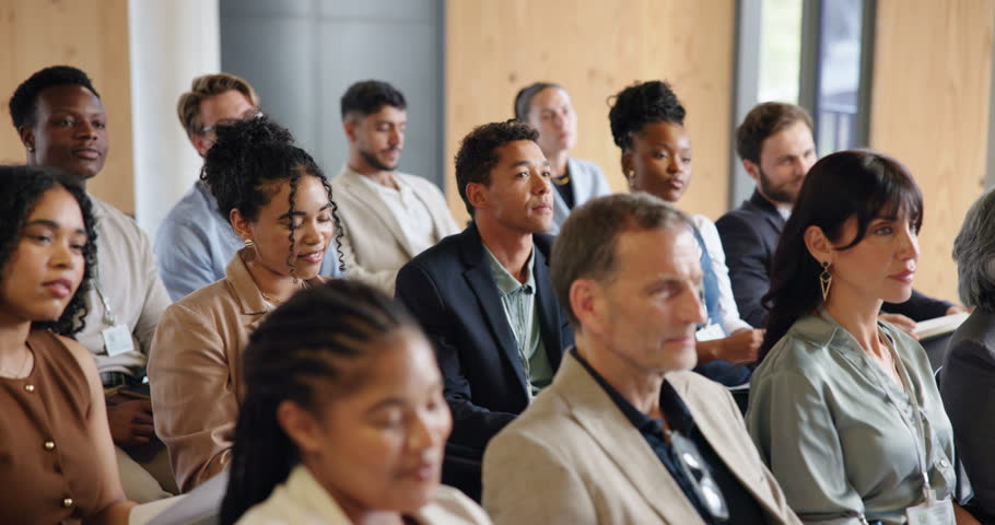 Business, seminar or people in crowd with nodding, presentation or engagement at event. Corporate, group of employees at conference with understanding, audience agreement or approval at trade show.