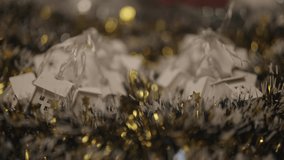 Close-up of unrecognizable person turning on cozy Christmas house shaped string lights creating festive atmosphere, preparing for winter holiday decorations and celebration. Shooting in slow motion. - Powered by Shutterstock - Get 15% off with code: PIKWIZARD15