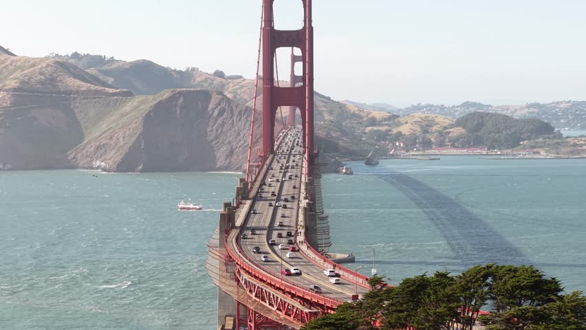 Golden Gate Bridge Traffic, Drone Shot of San Francisco Landmark on Sunny Day, California USA