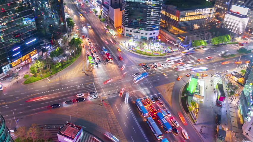 High angle view of a busy intersection in the Gangnam District at night, time lapse, Seoul, South Korea.