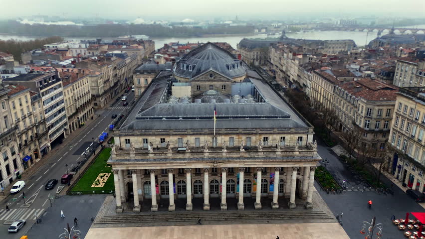 Aerial close up of Grand Theatre Bordeaux neoclassical facade in mist