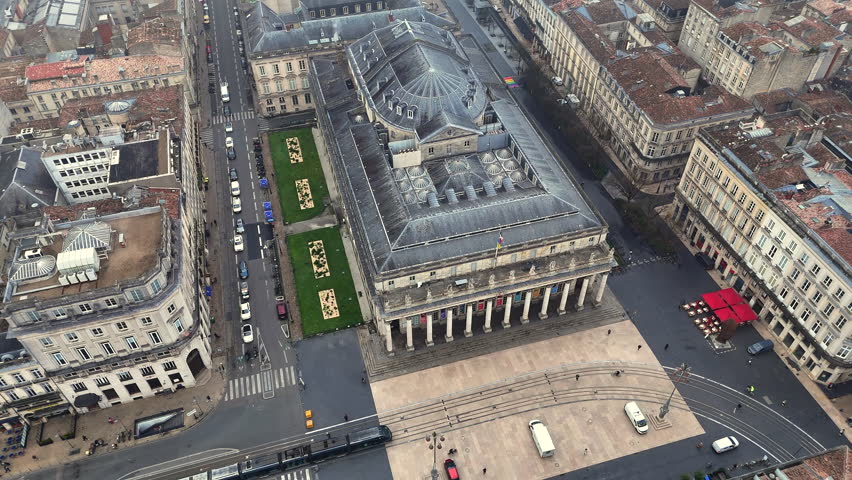 Drone view Grand Theatre Bordeaux tramway traffic and river bridge