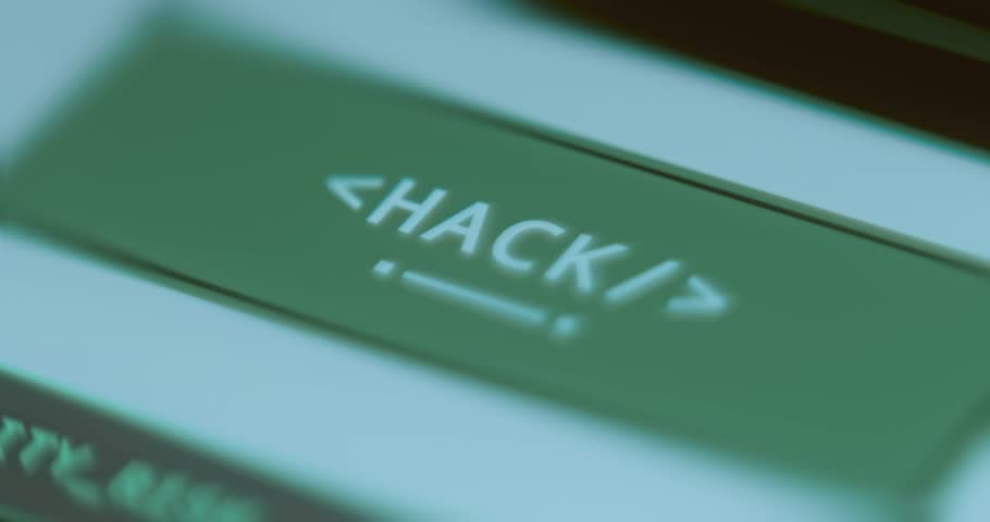 Finger taps a green button with word HACK