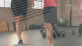 Male trainer signaling start guiding female client into one-leg hold near kettlebells for fitness. Balance, workout, gym, coach, training, partners, exercise - Powered by Shutterstock - Get 15% off with code: PIKWIZARD15