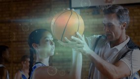 Coach guiding teen in gym adjusting grip letting go teaching basketball shot form vfx showing arc. Coaching, mentoring, drills, technique, focus, teamwork, arena - Powered by Shutterstock - Get 15% off with code: PIKWIZARD15