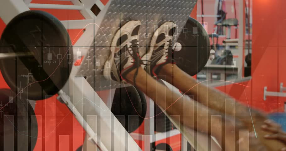 Man placing feet on footplate, performing controlled leg-press lowering plates, building fitness. Gym, strength, training, weights, bench, athletic, focus