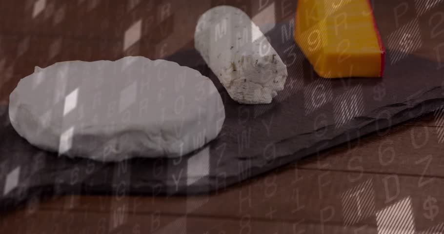 Overlay appearing over dark slate holding three cheeses, shifting and zooming to visualize data. Board, platter, dairy, artisanal, rustic, minimal, modern