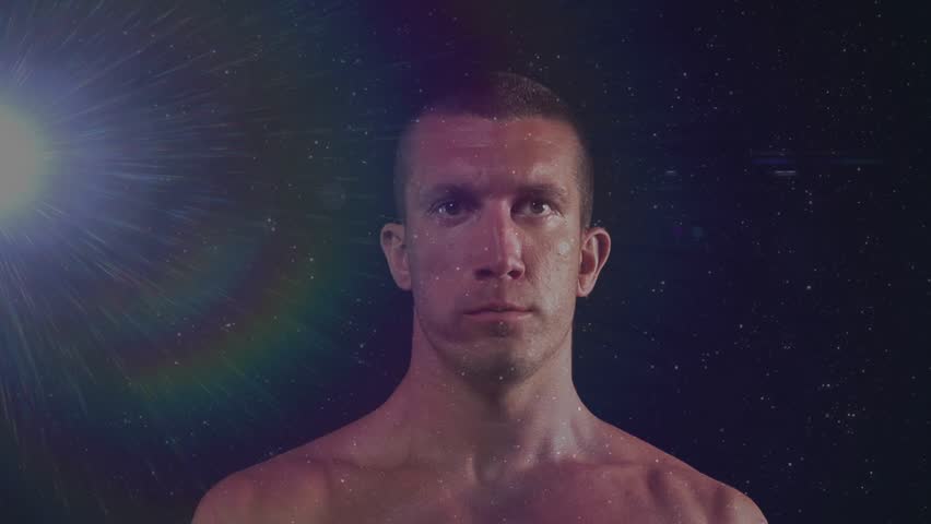 Fitness trainee grabbing kettlebell, lifting toward camera, lens flare overlapping face, training. Athlete, torso, weight, studio, glow, halo, grit