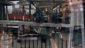 Man entering frame from right and loading plates while candlestick charts overlaying gym. Weights, barbell, athlete, strength, training, equipment, mirrors - Powered by Shutterstock - Get 15% off with code: PIKWIZARD15