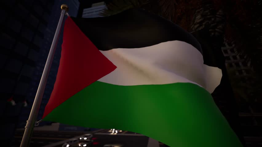 Palestine national flag waving at night in a modern city illuminated by street lights, buildings and moving traffic within an urban skyline. The darkness of the sky contrasts sharply with the artificial glow of the metropolis, making the national colors pop with intensity. The black stripe blends slightly into the night, while the white and green bands catch the reflection of sodium vapor and LED lamps. The red triangle is distinctly visible, anchoring the design. In the background, the blurred lights of cars create streaks of red and white, symbolizing the ceaseless motion of life in cities like Hebron or Jenin. The banner flutters in the cool nocturnal air, its movement smoother and more heavy than during the day. The architecture is defined by windows lit from within, suggesting activity and habitation. This scene evokes a sense of vigilance and permanent presence. The emblem remains aloft, watching over the sleeping town. The footage suits projects discussing nightlife, security, or the 24-hour cycle of news in the region. The fabric creates dynamic shadows on itself as it folds and unfurls. The mast gleams metallic under the floodlights. The atmosphere is electric yet poised. The standard serves as a beacon in the dark, a point of reference in the complex visual field of the urban night. The surrounding noise is implied by the visual busyness of the background lights, yet the ensign itself moves with a silent grace. This imagery captures the modern reality of the state, blending tradition with the infrastructure of contemporary living.