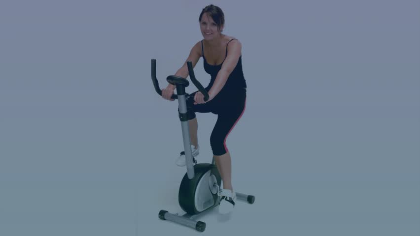 Fitness pro pedaling on bike, starting HUD on torso showing data transfer, red progress bar filling. Cycling, studio, athletic, cardio, display, overlay, digital
