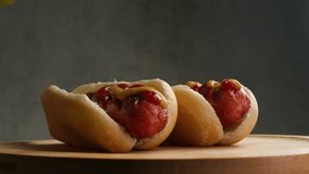 Close up of hot dog with German flag, scene links snack with German sausage traditions and local bakery for rolls. - Powered by Shutterstock - Get 15% off with code: PIKWIZARD15