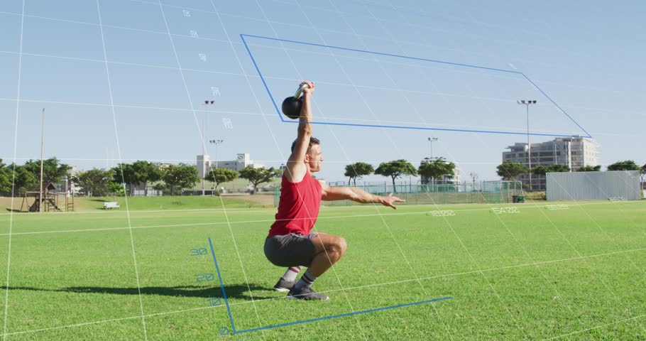 Man rising from squat starting kettlebell snatching, charts overlaying body metrics for training. Strength, fitness, outdoor, grass, athlete, workout, balance