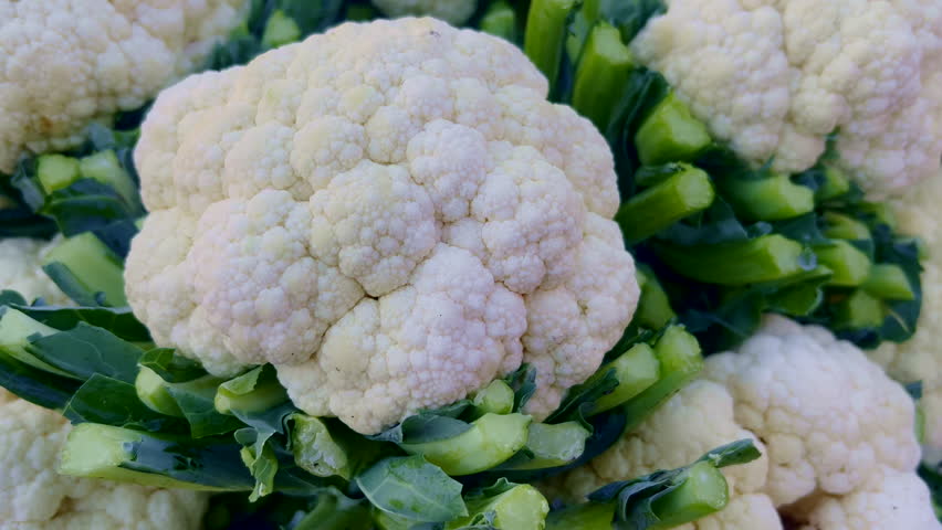 4K close-up shot of fresh green chilies displayed at a Pulavar market stall, highlighting vibrant color, texture, and organic produce—ideal for food, agriculture, and spicy ingredient themes.