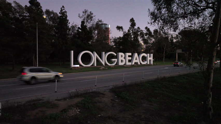 Long Beach, California, USA - Aerial View of the 'Long Beach' Sign in the Evening Showing the Downtown Area