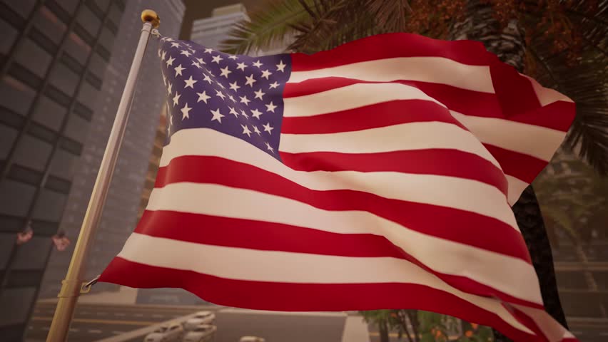United States national colors displayed in a nocturnal setting, lit by a dedicated spotlight positioned at the base of the pole. The artificial illumination, approximately 4500K, highlights the fabric against the stark blackness of the night sky. In the background, the cityscape is reduced to a matrix of out-of-focus bokeh orbs created by streetlamps, office windows, and vehicle headlights. The camera remains static on a tripod, utilizing a telephoto lens with a focal length of 85mm or greater to compress the distance between the foreground emblem and the distant urban grid. The aperture is wide open to maximize light intake and enhance the background blur. The textile moves sporadically, reacting to inconsistent wind gusts common in urban environments at night. The high contrast scene ranges from the bright white of the illuminated stars to the deep shadows in the folds of the cloth. Digital noise is kept to a minimum through low ISO settings, preserving the integrity of the color information. The spotlight creates specular reflections on the synthetic material
