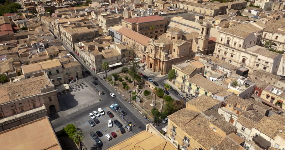 Aerial view of San Domenico church located in Piazza XVI Maggio in the historic center of Noto, in province of Syracuse, Sicily, Italy. It