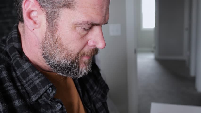 Middle Aged Man Using My Friend Friendly AI Chat Bot for Mental Health and Wellness - How Far is Too Far with Artificial Intelligence Concept