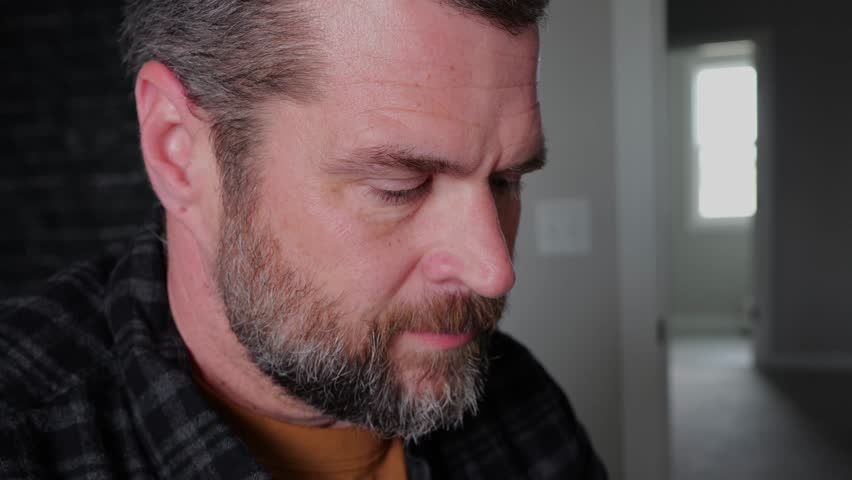 Middle Aged Man Using My Friend Friendly AI Chat Bot for Mental Health and Wellness - How Far is Too Far with Artificial Intelligence Concept