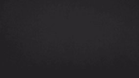 Slow vertical tear in real black paper gently slides sideways for a calm, cinematic paper reveal.
 - Powered by Shutterstock - Get 15% off with code: PIKWIZARD15