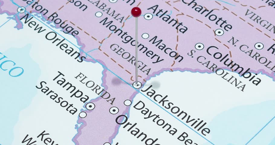 A zoom out of a red pin into a Jacksonville city of The United States of America political map