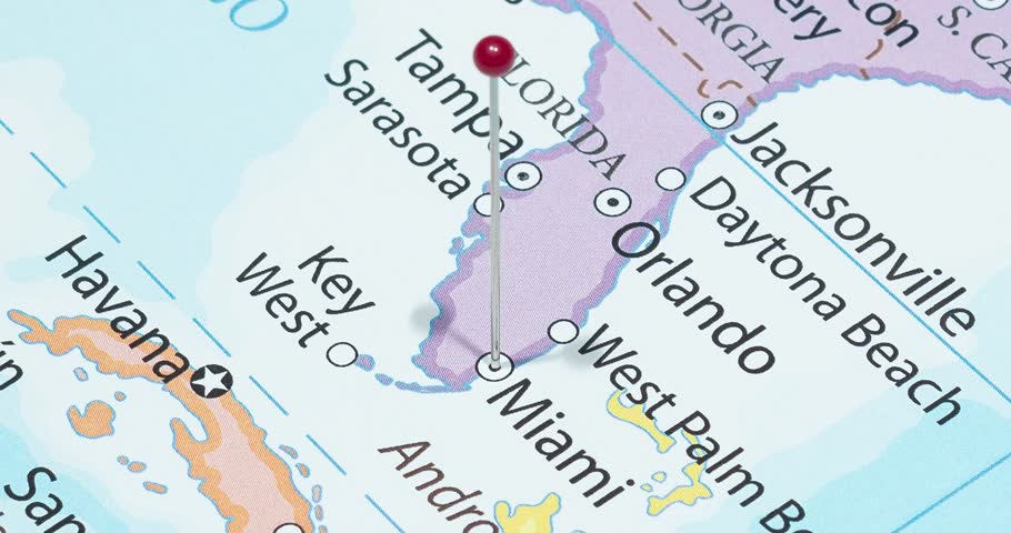 A zoom out of a red pin into a miami city of The United States of America political map