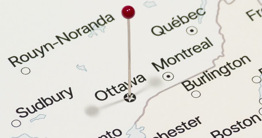A zoom out of a red pin into a ottawa city of Canada political map