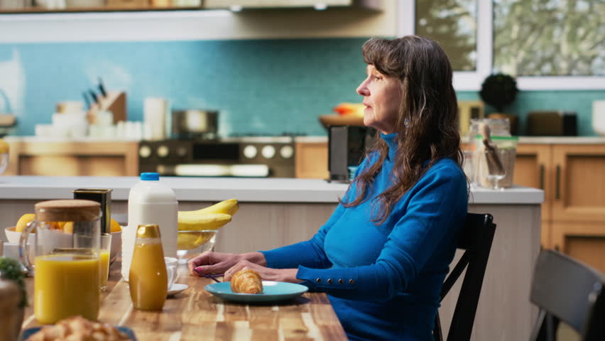 Old man and woman reading ingredients on organic product label, being conscious about eco friendly sustainable food for healthy lifestyle and balanced meal choice. Wellness and longevity. Camera B.