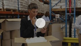 Mature woman manager tapping tablet and checking box, initiating network overlay for logistics. Warehouse, packing, inventory, supervisor, teamwork, collaboration, efficiency - Powered by Shutterstock - Get 15% off with code: PIKWIZARD15