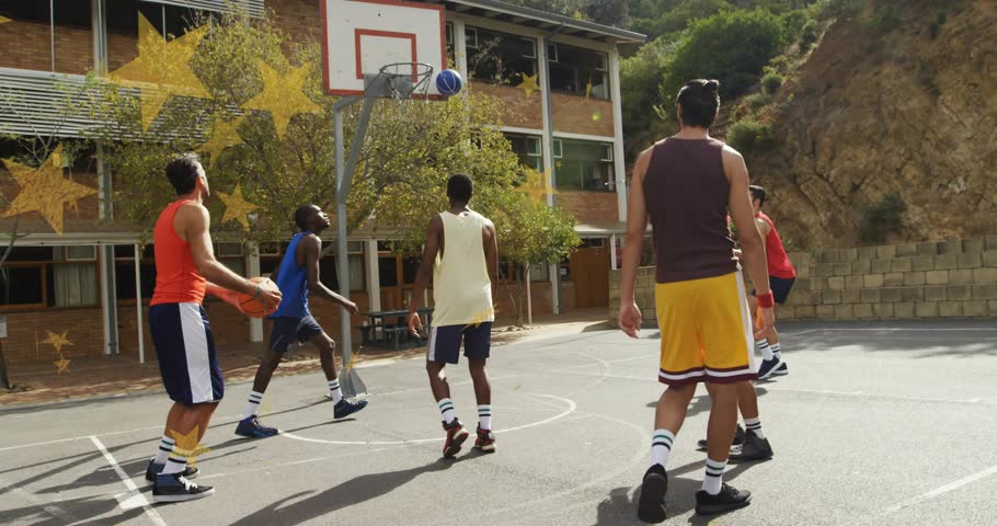 six men playing basketball at hoop shooter shooting orange ball rebounding scoring yellow stars pop. Group, court, outdoor, campus, hillside, benches, motion