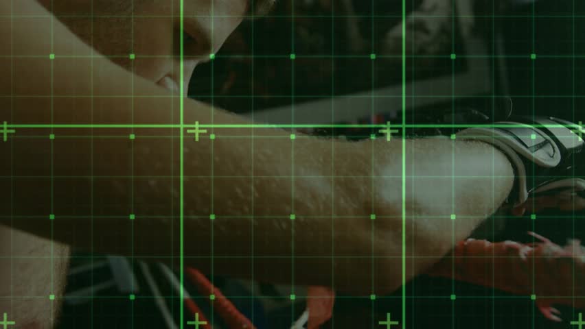 Male athlete leaning on rope, adjusting glove while green HUD tracking vitals, preparing for boxing. Competitor, training, gym, mitts, focus, concentration, combat