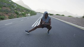 NEW COLLECTION popping pink to white over torso sparking athlete doing side lunge promoting fitness. Man, workout, lateral, outdoor, road, mountain, hoodie - Powered by Shutterstock - Get 15% off with code: PIKWIZARD15