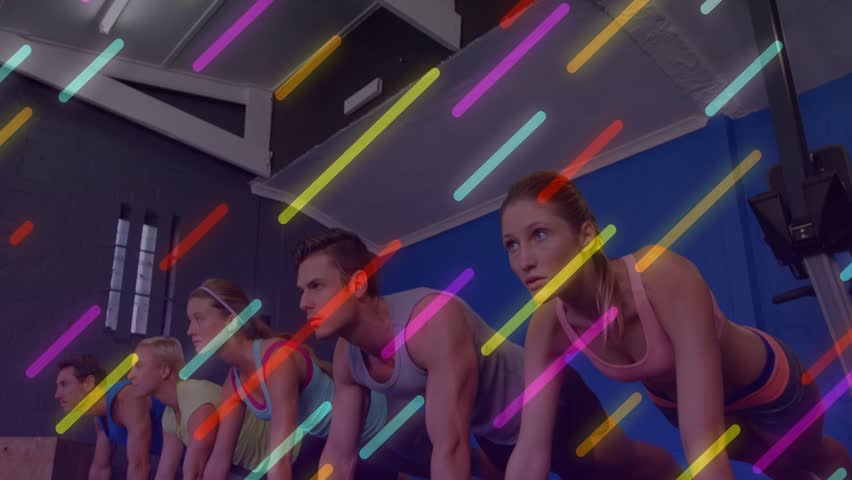 Five gym crew entering holding high plank on mat, core while neon streaks sweeping over group. Synchronized, teamwork, fitness, studio, workout, balance, stability