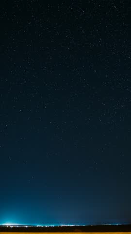 Time Lapse Night Starry Sky Stars And Meteoric Track Trails. Trace Of Sun. Meteors Fly Across Sky. Sunrise Sky Natural Background. Spin Trails Of Stars. Star Trails On Night Sky Background. Meteors