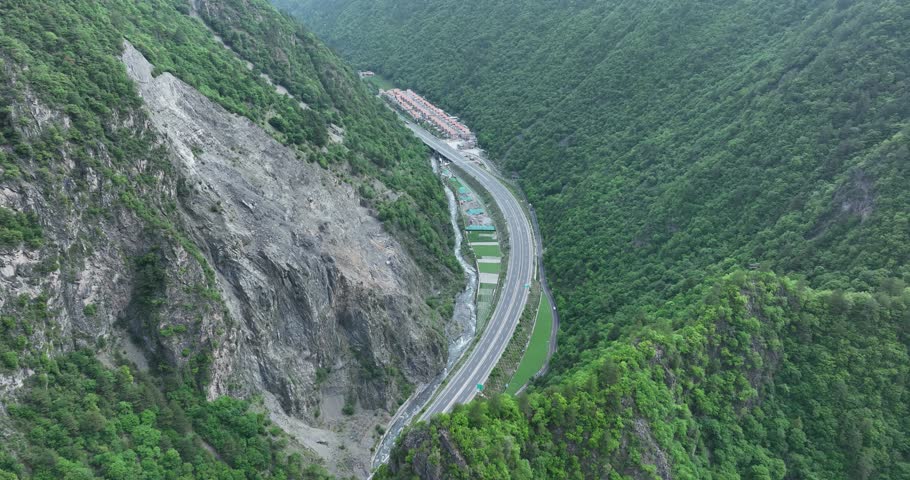Aerial footage of beautiful high altitude green forest landscape