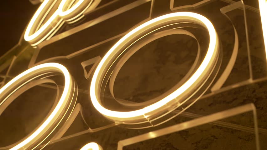 Neon Sign Close-Up – Glowing Letter O Detail