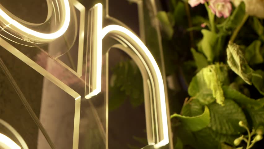 Bright Neon Letter H – Decorative Sign in Close-Up