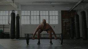 Male lifter starting pull and performing barbell to overhead squat showing green charts for fitness. Weightlifting, gym, athlete, training, strength, focus, determination - Powered by Shutterstock - Get 15% off with code: PIKWIZARD15