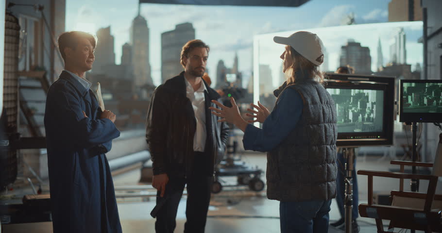 Female Director Briefs Two Male Actors on Rooftop Film Set, Revealing Collaborative Behind the Scenes Directing, Discussing Drama, Acting and Performance, Shot Planning During Movie Production