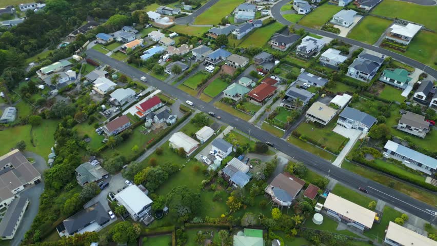 Aerial view of Coopers Bay homes, North Island, New Zealand, peaceful vibes