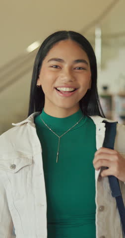 Face, girl and teen in high school with smile, knowledge or scholarship for academic development. Education, gen z and student in hallway with confidence, pride and growth in learning opportunity.