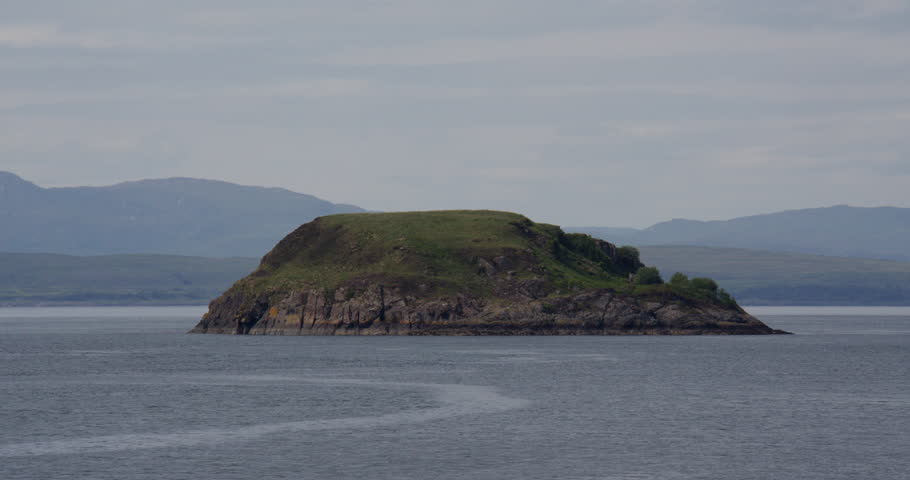 Wide shot of the south side of Maiden Island, in the sound of Kerrera