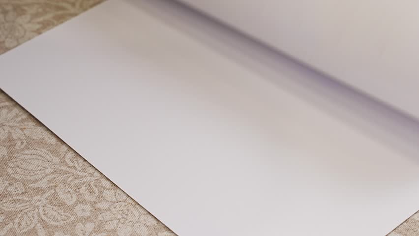  turning the pages of a tear-off wall calendar. Printing calendars with photos as a gift. the rapidity of the passage of time. anticipation of a holiday, event or meeting.