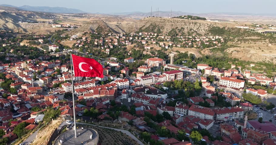 A scenic aerial panorama of the historic town of Beypazarı, Turkey. Perfect for cultural documentaries, travel films, tourism promotions, architectural features, and cinematic establishing shots.